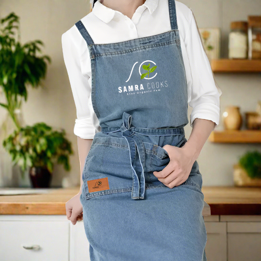 100% Washed Denim Apron with pockets very fashionable. Embroidered Samra cooks logo
